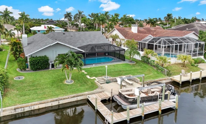 Pelican Casa | OFERTA 18-23 DE MAYO Canal del Golfo Piscina climatizada Bañera de hidromasaje Playa Alquiler de botes