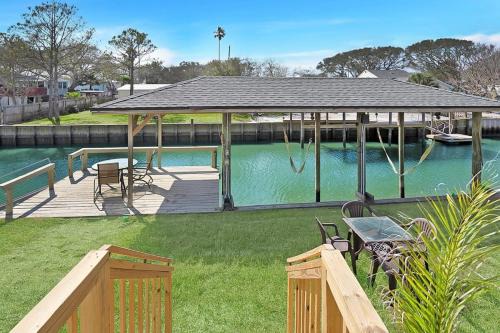 Butler Beach Casa | Canal Home Dock Walk to Beach Kayaks SUP Fishing