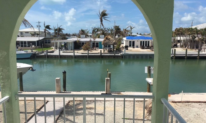 Key Colony Beach Condominio | Canal side location with beach & pool club membership!