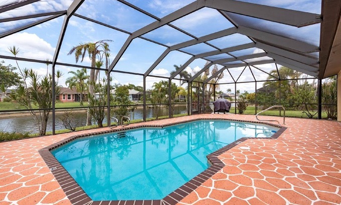 Fort Myers Villa | CIUDAD DEL CABO CORAL FLORIDA CON PISCINA CLIMATIZADA, MUELLE PRIVADO