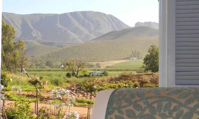 Langeberg Casa | Cape Winelands cabaña de 90m2 con hermosas vistas de viñedos, montañas y orcha