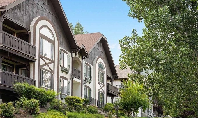 Midway Complejo | Captivating 2-bedroom Swiss Chalet Charm Meets Mountain Adventure