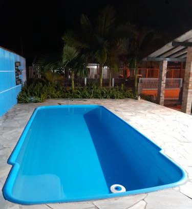Pontal do Parana Casa | casa aconchegante com piscina e jardim