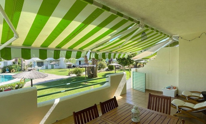 El Portil Casa | Casa adosada cerca de la playa en urbanización agradable con piscina, pista de