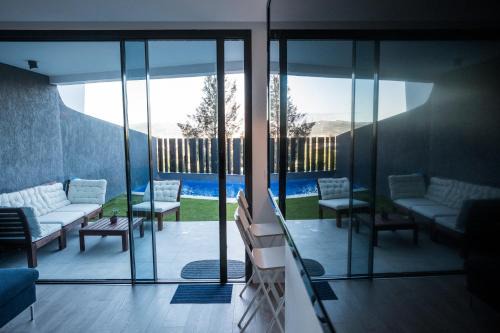 Caleta de Velez Casa | Casa Aire de Mar, modern house with private pool, overlooking Baviera golf, within walking distance of beach