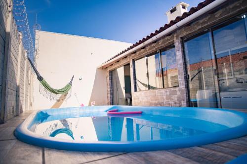 Sao Goncalo Casa | Casa Areal,1 Suíte, 2 Quartos Climatizados, piscina e Estacionamento 2 carros