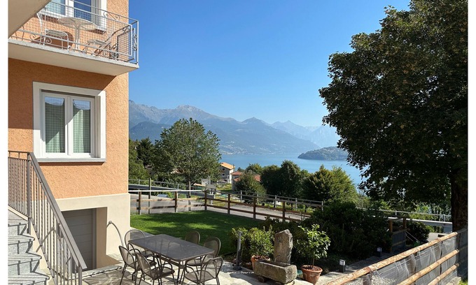 Vignola Casa | "Casa Azalea" - Vista al lago de Como - jardín y estacionamiento privado - WiFi gratis