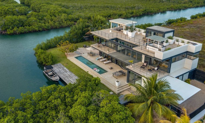 Placentia Villa | Casa Balam, A Stunning Waterfront Villa, w/Boat, 40ft Pool & Rooftop Bar