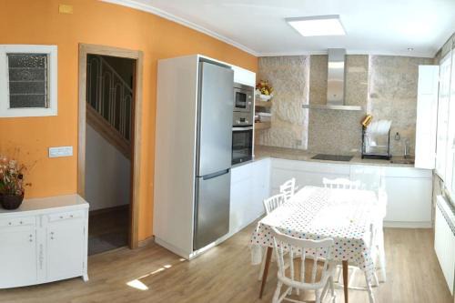 O Irixo Casa | Casa Carmiña: Casa para pequeños grupos en el corazón de Galicia