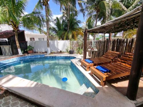 Chuburná Puerto Apartamento | Casa Columpios, con alberca a pasos de la playa