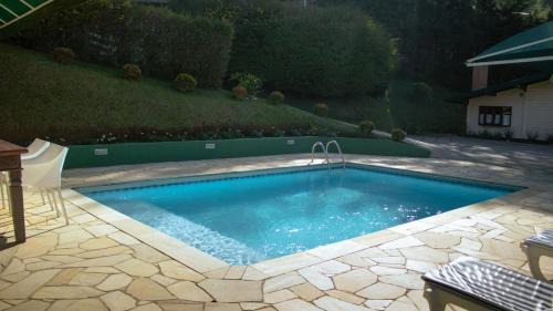 Alto da Boa Vista Casa | Casa com lareira e lazer, em Campos do Jordao SP