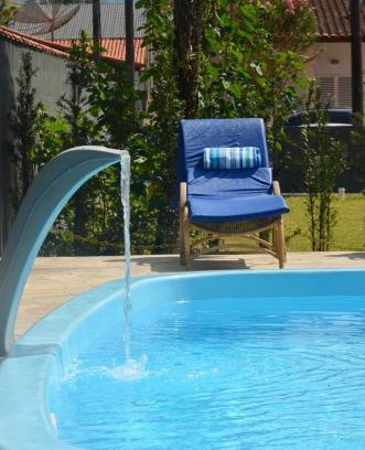 Balneario Mogiano Casa | Casa com piscina 500m da praia condomínio Morada da Praia