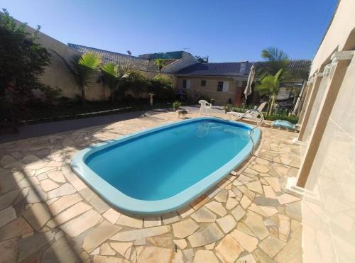 Guaratuba Casa | Casa com Piscina a 500m da Praia Ideal para Famílias em Guaratuba
