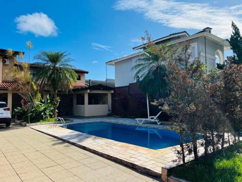 Morada da Praia Casa | Casa com piscina e churrasqueira próximo à praia
