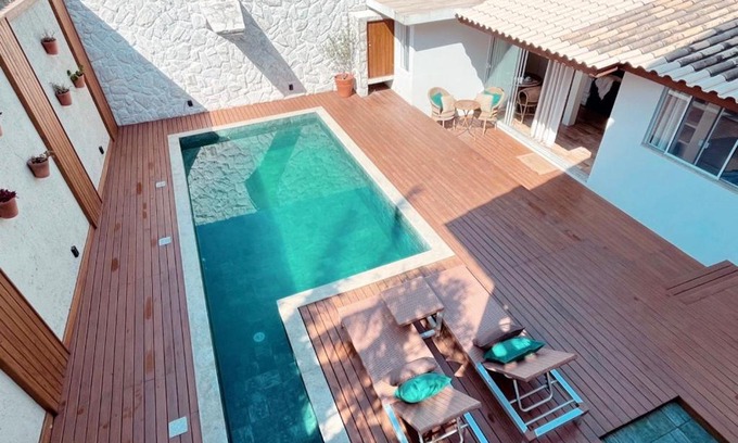 Santinho Casa | Casa com piscina em frente à Praia do Santinho