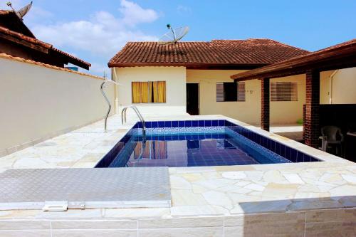 Balneario Mogiano Casa | Casa com piscina no litoral norte