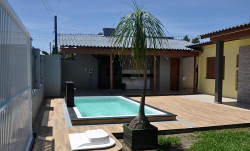 Capao da Canoa Casa | Casa Com Quatro Dormitórios Pertinho Do Mar Em Capão Da Canoa