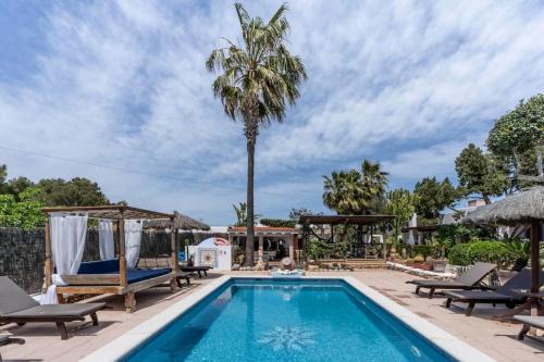 Santa Eulalia del Río Casa | Casa con piscina, jardín y juegos exteriores