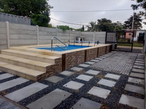 Parque del Plata Casa | Casa con piscina climatizada para 6 personas en Parque del plata