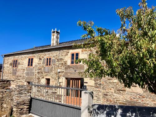 Portomarín Casa | Casa da Forxa, renovated former forge/smithy