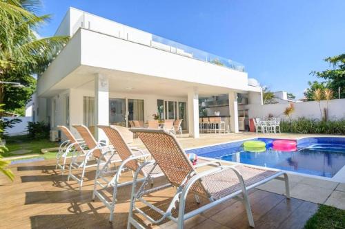 Praia de Barequecaba Casa | Casa de alto padrão, com 5 suítes, a 50m praia de Barequeçaba