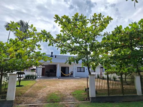 Palhoca Casa | Casa de praia Brisa das Amendoeiras