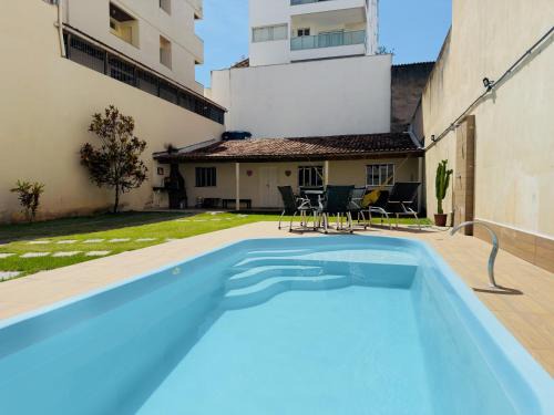 Praia do Morro Apartamento | Casa de Praia com Piscina, quintal, lazer e churrasco, 3 quartos com ar condicionado, sendo 2 suites para sua familia!