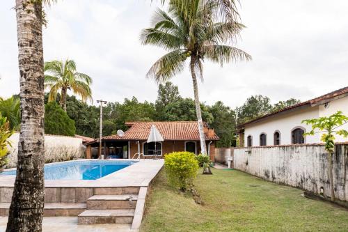 Morada da Praia Casa | Casa em Bertioga no Cond Morada da Praia com piscina