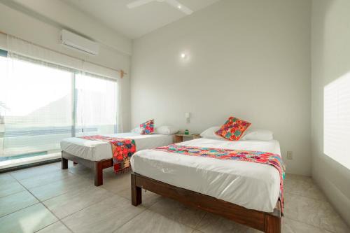 Tamarindos Apartamento | Casa Flores Zicatela