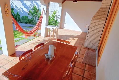 Estufa I Casa | Casa Temporada Ubatuba próxima à praia, check-in e out flexíveis com 5 vagas na garagem, wifi