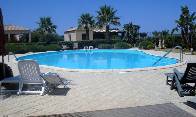 Custonaci Casa | Casa Vacanze Libeccio - Villetta con giardino e piscina condominiale