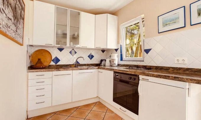Teguise Complejo | CASA VERDE Apartamento 2 con jardín privado acceso a la piscina.