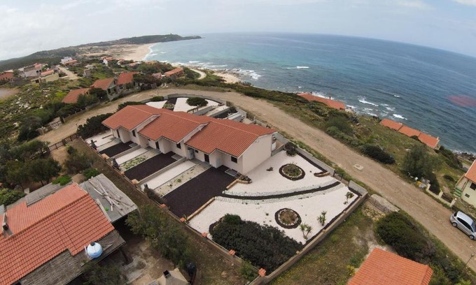 Arbus Casa | CASA VITALIA- SUPER Vista Mare-2 camere -Giardino-BBQ - WiFi FREE-Parcheggio IUNP5732