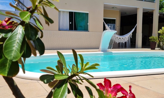 Barra do Jacuipe Casa | (Casaparatemporada15) 4 bedrooms with access to the beach and Jacuípe river