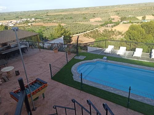 Fontanar Casa | Casas Cuevas El Mirador con piscina y barbacoa