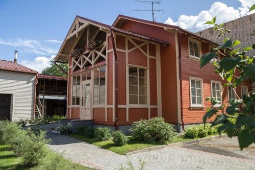 Cesis Casa | Center Orange house