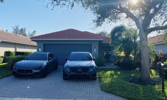Cascades Casa | Centrally located Modern Lake-front House in the Heart of Estero