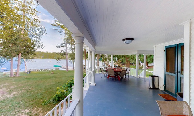 Charlotte Cabaña | Century-old lakefront Victorian on a private island with boats & beach - dogs OK