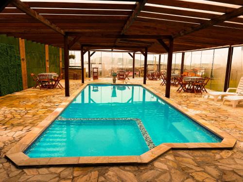 Vila Alvorada Casa | Chalé com Piscina Aquecida - Vista Panorâmica da Praia, a 200m do Mar, Sala de Jogos, Academia e Churrasqueira
