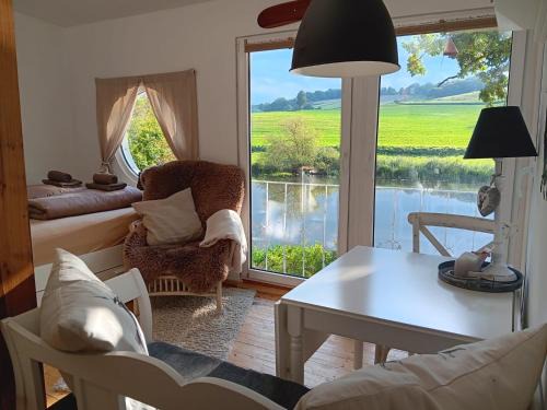 Guxhagen Casa | Chalet am Flussufer in der Natur mit Kaminofen