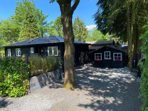 Krachtighuizen Chalet De Esquí | Chalet de Vrijheid tussen Putten en Garderen