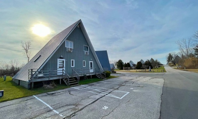 Stevensville Casa | Chalet on the Lake 56 w/ Beach Access, Pools, Sport Courts, Fishing Pond & more!