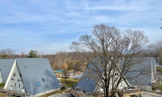 Stevensville Casa | Chalet on the Lake 39 w/ Beach Access, Pools, Sport Courts, Fishing Pond & more!