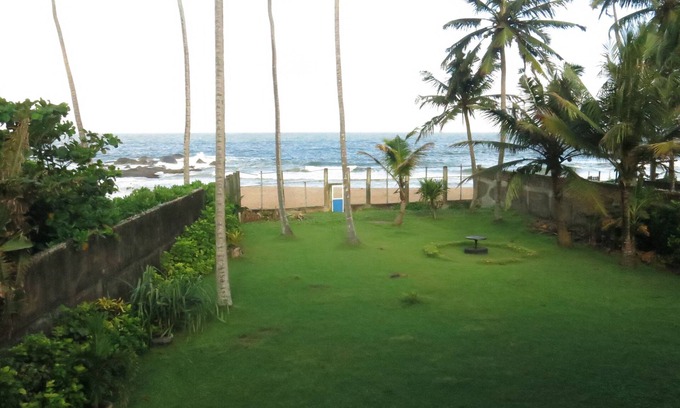 Ambalangoda Casa | Champtil Ambalangoda, Large house with garden next to the beach and sea.