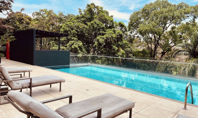 Ciudad Cariari Apartamento | Charming 1-bedroom apartment with WiFi, fitness room and pool in San Jose, CR