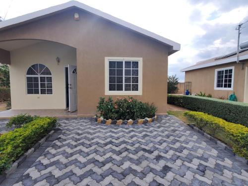 Portmore Casa | Charming 2-Bed House in Portmore gated community