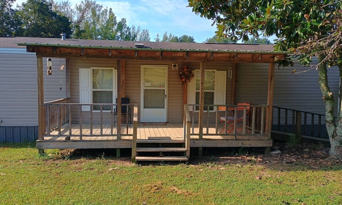 Langley Casa | Charming 2-bedroom mobile home in tranquil Langley, AR, with AC