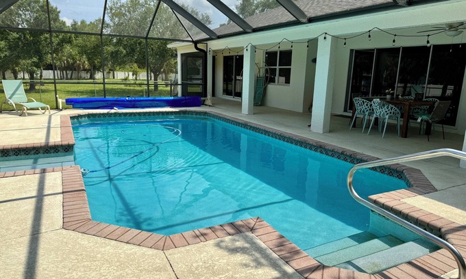 Joel Casa | Charming 4-bedroom house in enchanting Lehigh Acres with an amazing pool!