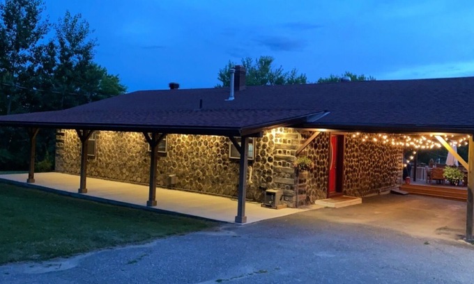 Whitewater Region Cabaña | Charming 4 Season Log Lake House w/ Hot Tub located in the Whitewater Region