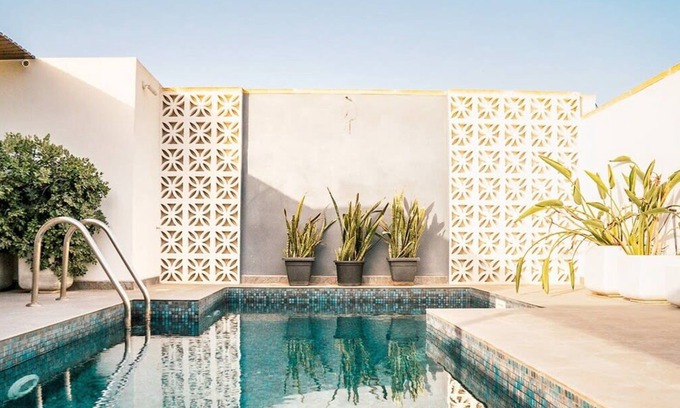 Qala Villa | A beautiful farmhouse with a rooftop pool